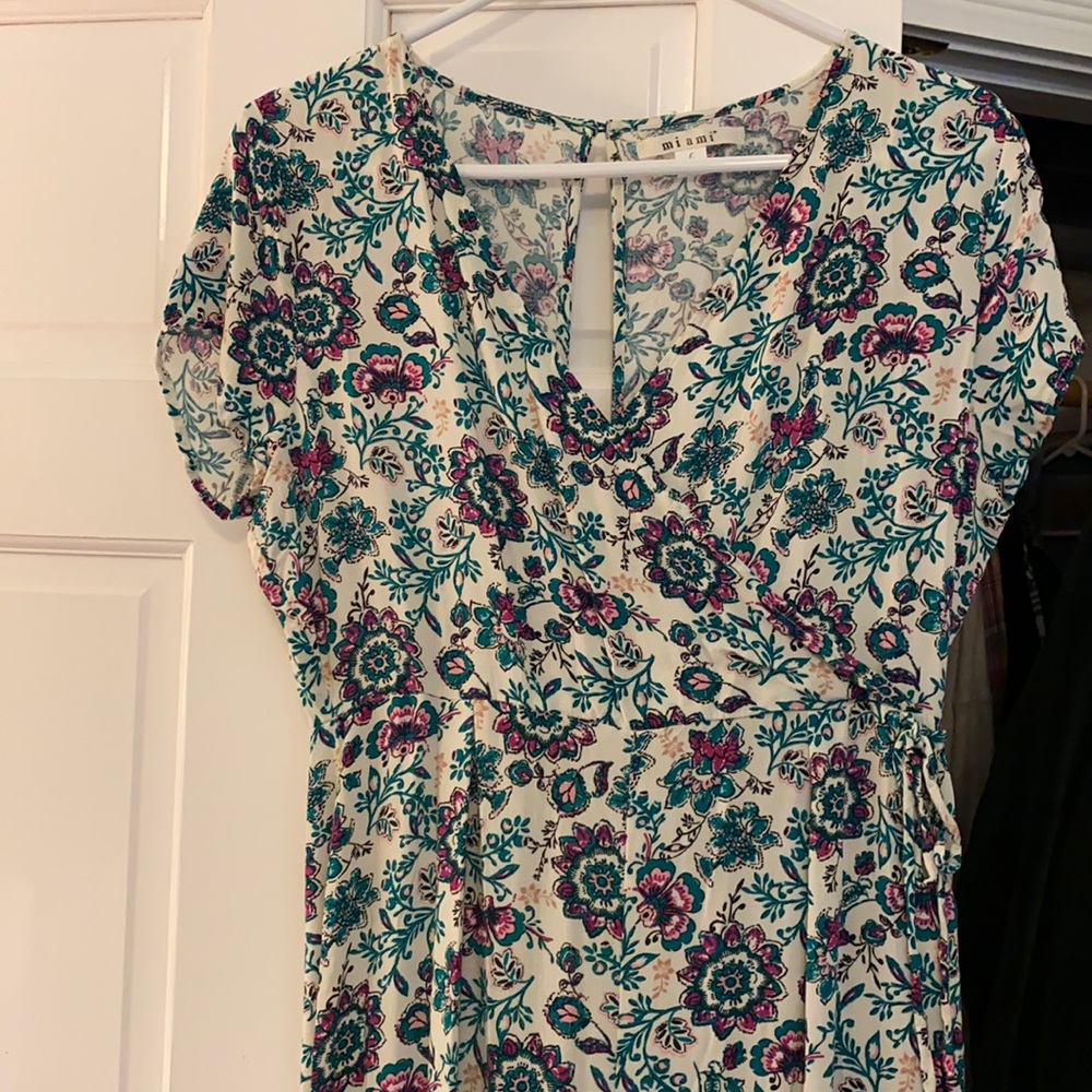 Francesca‘s floral romper. Worn once. Size large.